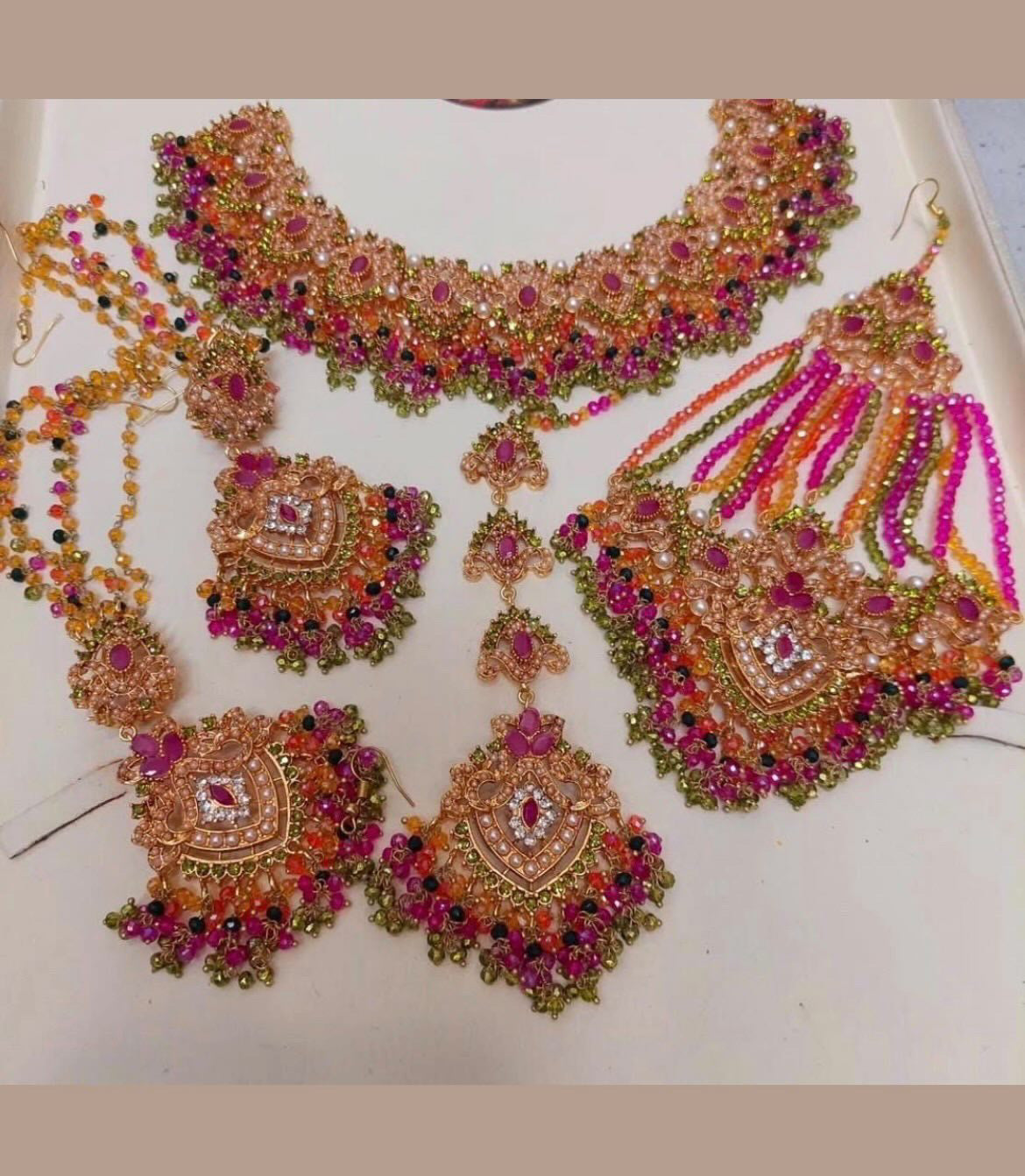 Olive green 
Hot pink 
Orange 
Green set - To be delivered to a Pakistan Address- needed End of July