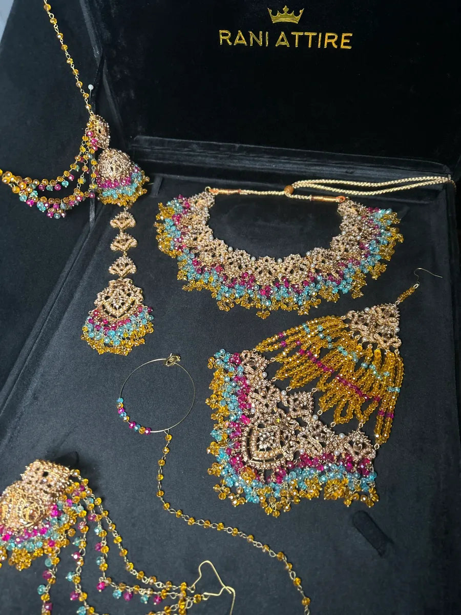 Mustard, Light Blue & Hot Pink coloured necklace set, with heavily beaded Jhumkies & tikka | Gold Stones - Jewelsbyrani