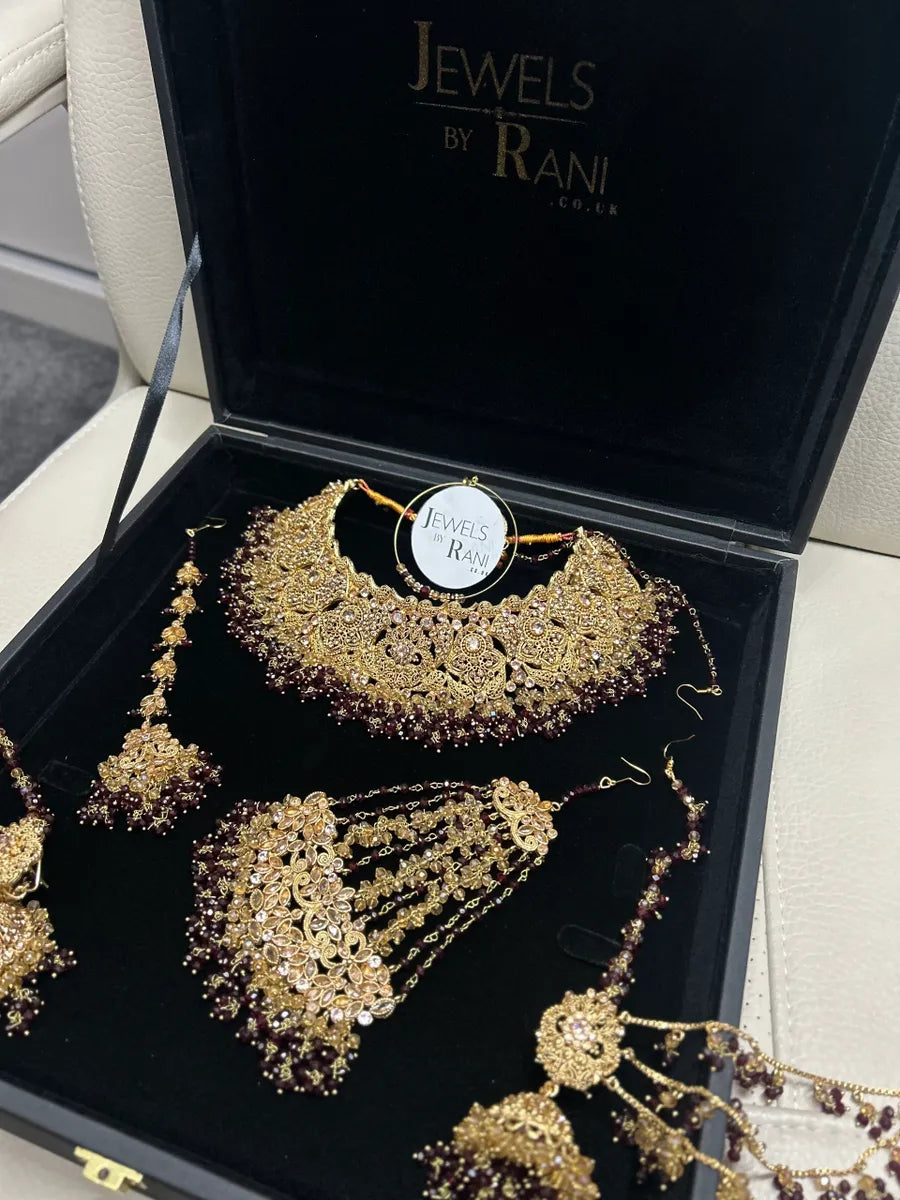 Deep Maroon & Gold Collar Necklace set, with heavily beaded earrings & tikka. - Jewelsbyrani
