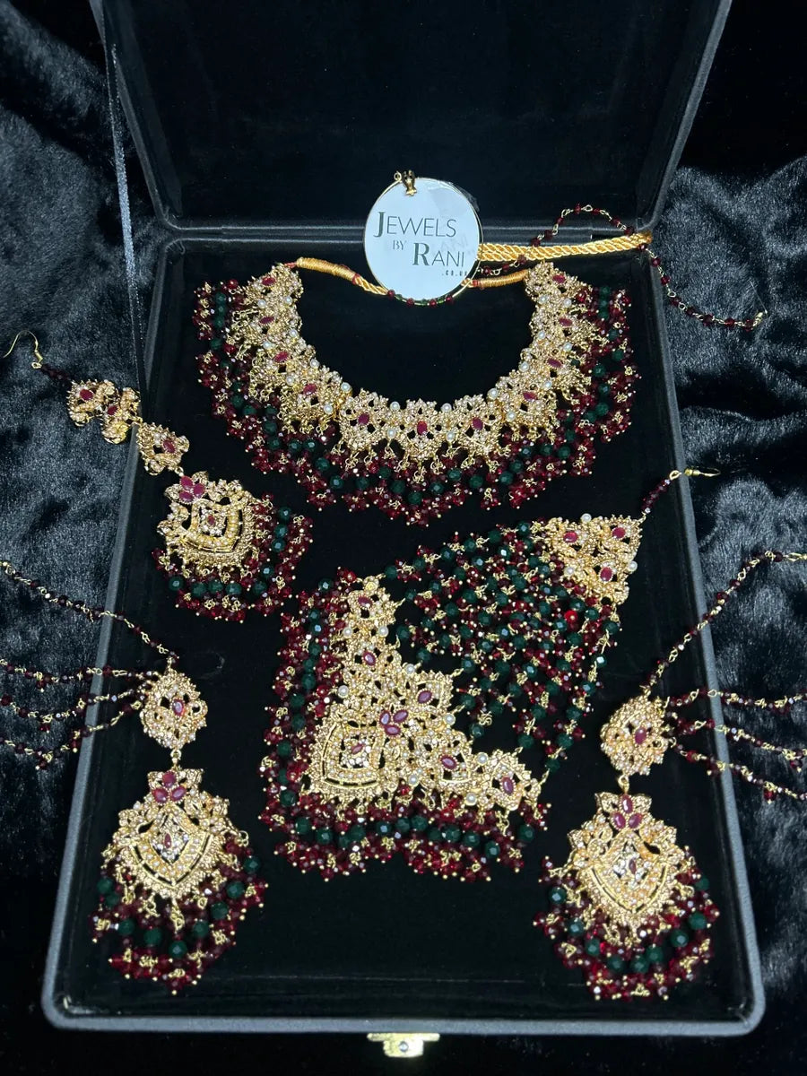 Green, Gold & Maroon Bridal Jewellery set, with heavily beaded earrings & tikka. - Jewelsbyrani