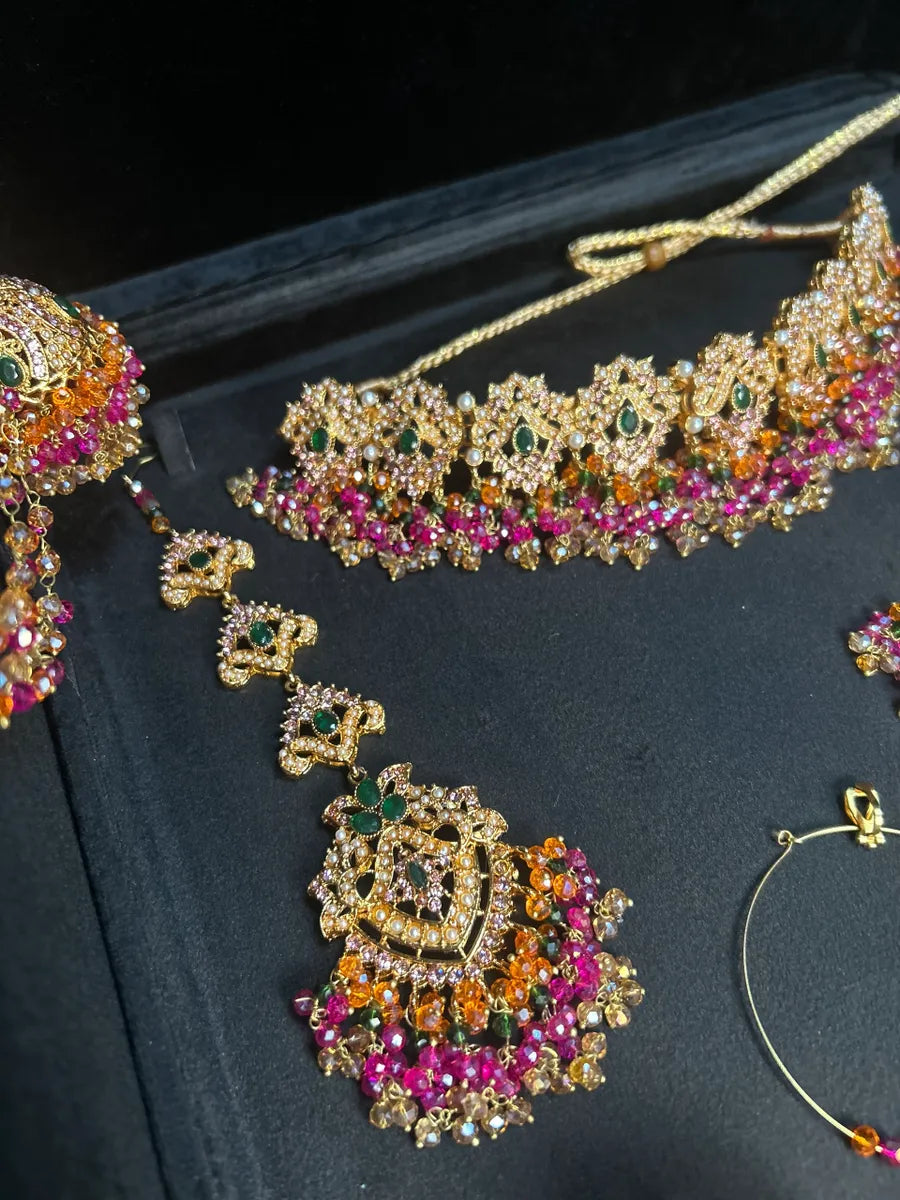 Multi Choker Green, Orange & Hot Pink coloured necklace set, with heavily beaded Jhumkies & tikka | Gold Stones - Jewelsbyrani