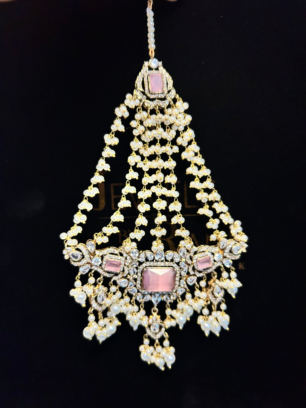 Pink and White Coloured heavily beaded jhumar