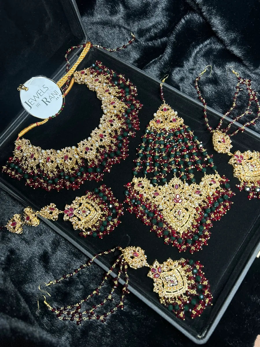 Green, Gold & Maroon Bridal Jewellery set, with heavily beaded earrings & tikka. - Jewelsbyrani
