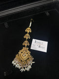 Gold and Baby Pink heavily beaded tikka.