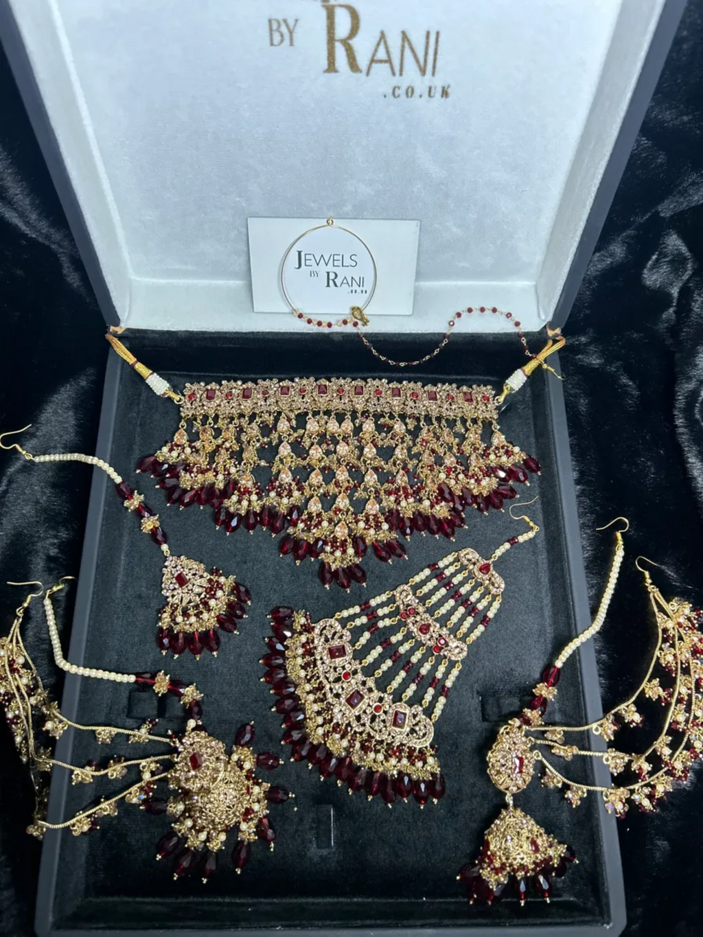 Pre Order 6 Week: Trending Dangled Crystal Deep Red 24 crt Gold Plated Bridal Jewellery Set - Jewelsbyrani