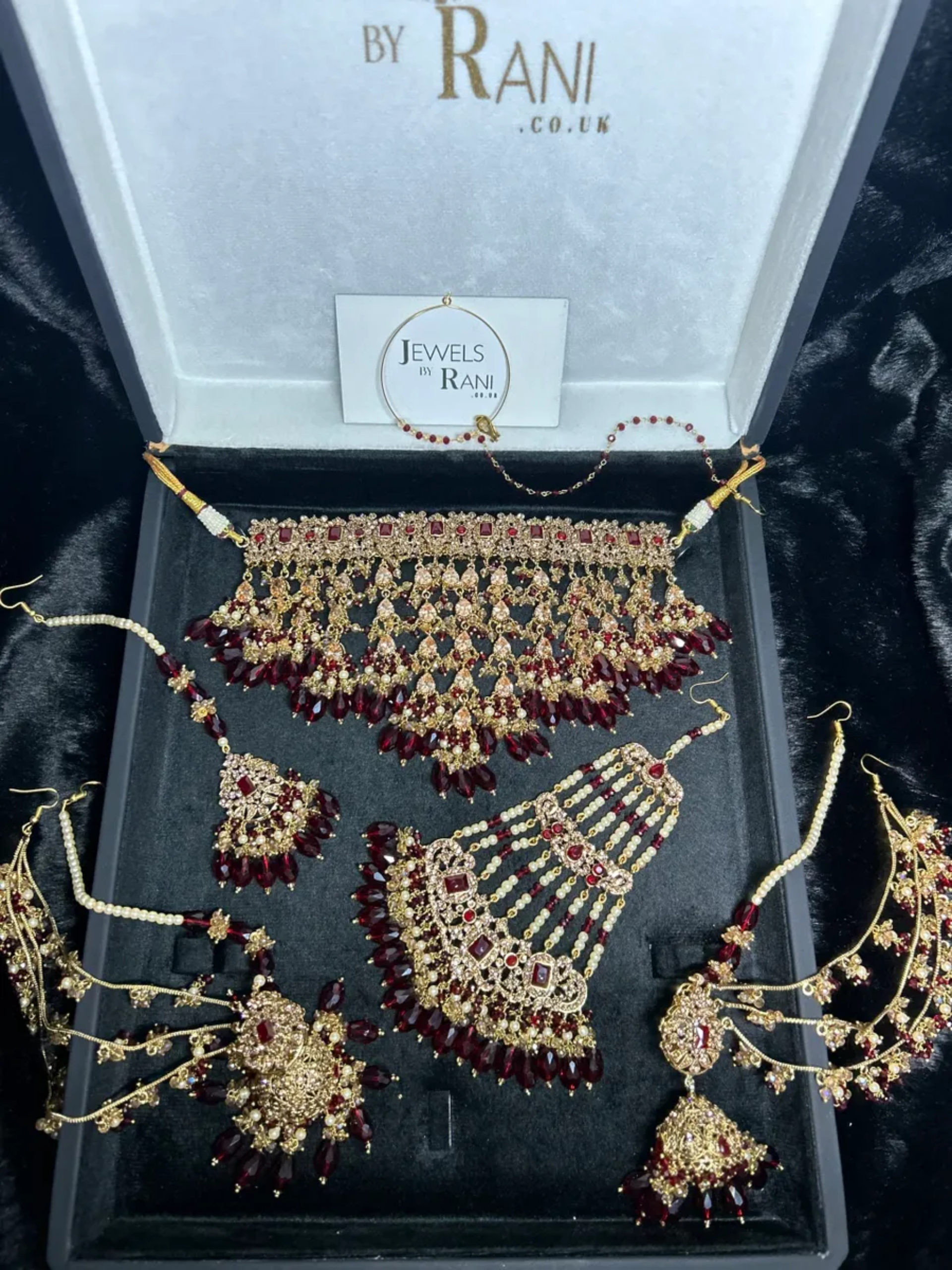 Pre Order 6 Week: Trending Dangled Crystal Deep Red 24 crt Gold Plated Bridal Jewellery Set - Jewelsbyrani