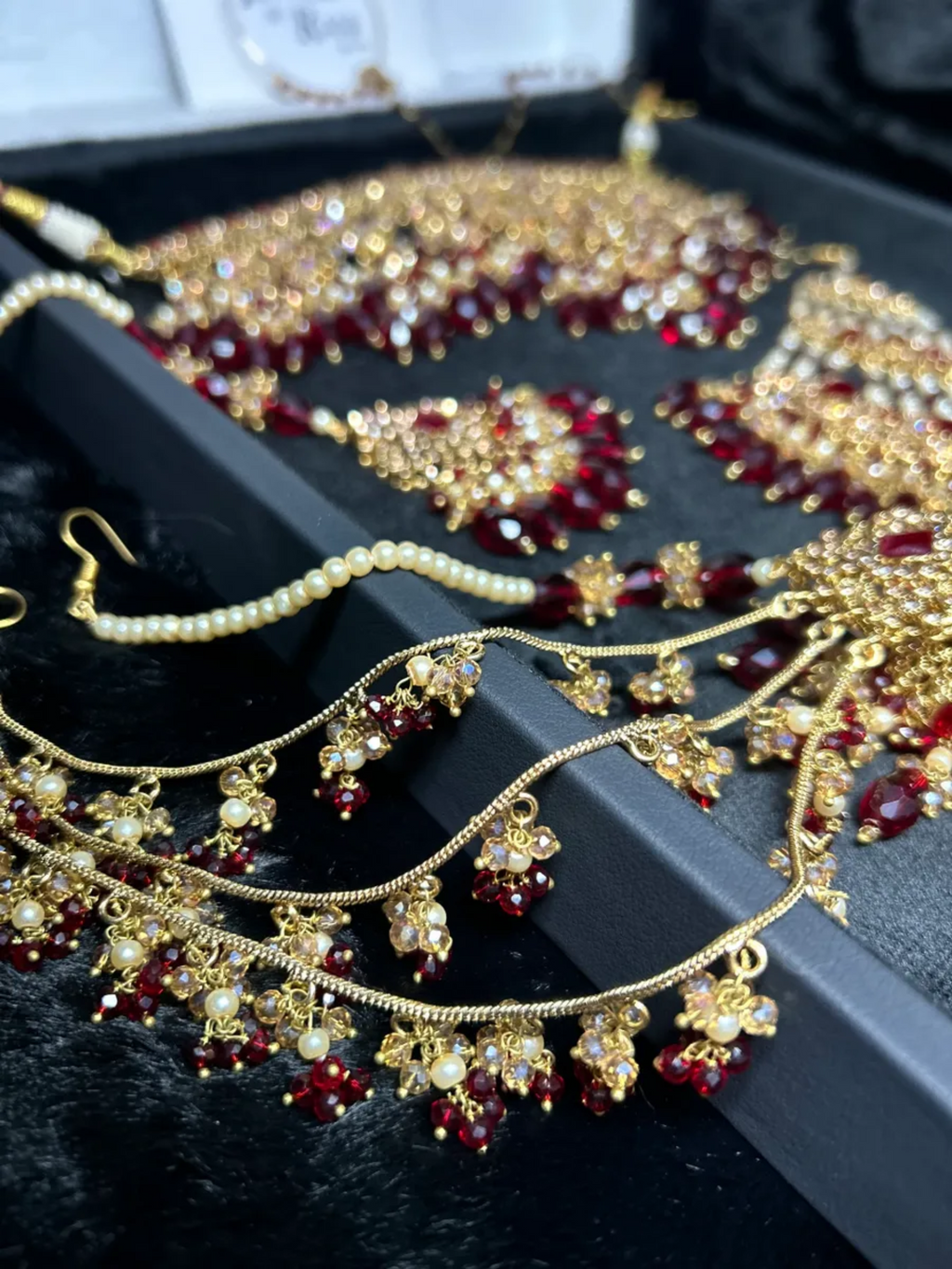 Pre Order 6 Week: Trending Dangled Crystal Deep Red 24 crt Gold Plated Bridal Jewellery Set - Jewelsbyrani