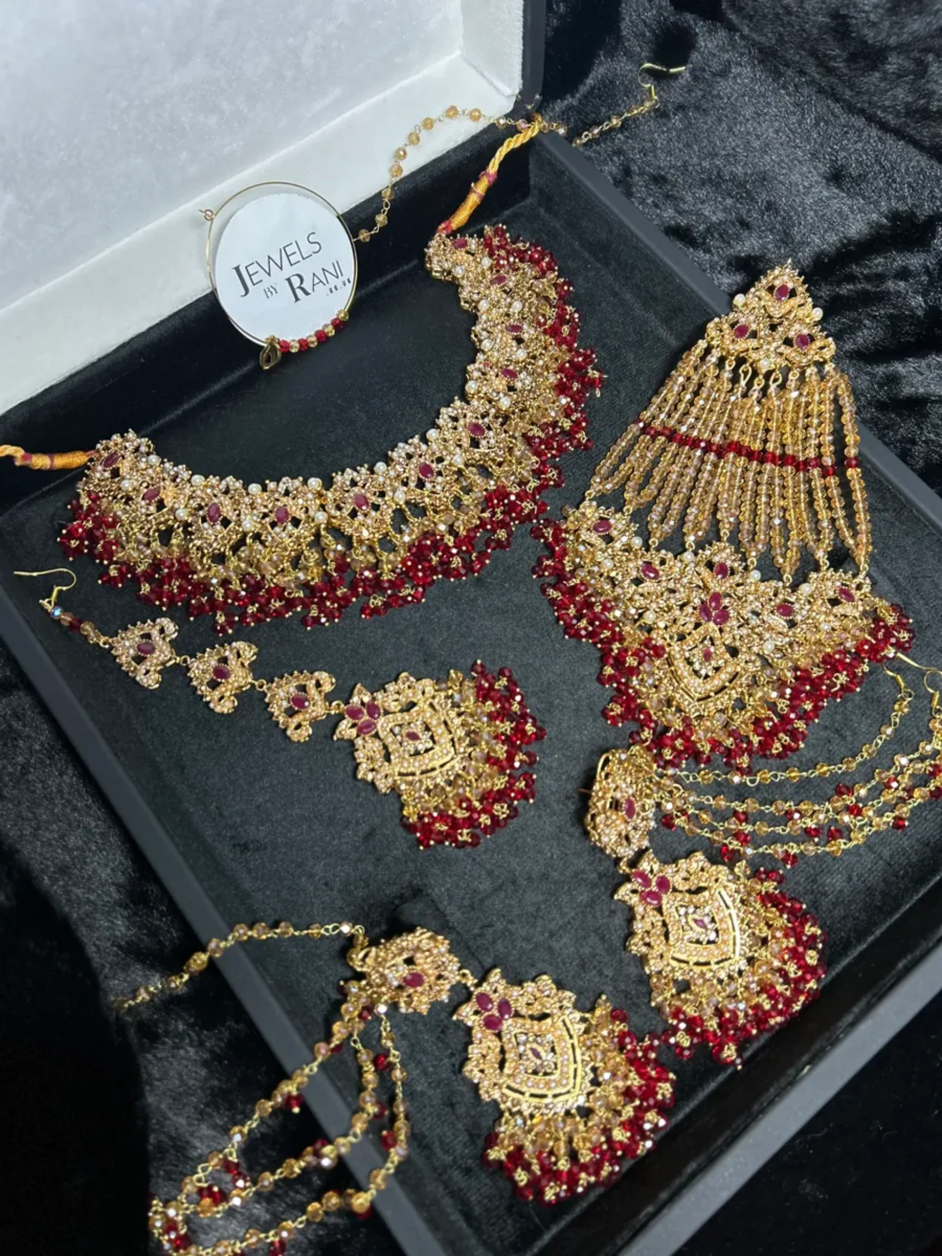 Beautiful Gold & Deep Red Bridal Jewellery set, with heavily beaded earrings & tikka - Jewelsbyrani