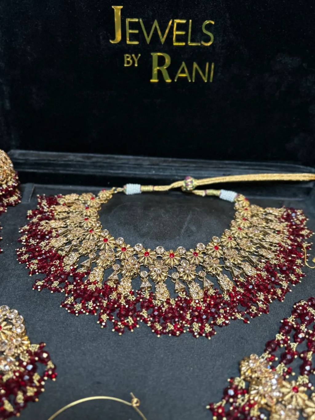 Beautiful Maroon 24 crt Gold Plated Bridal Jewellery Set - Jewelsbyrani