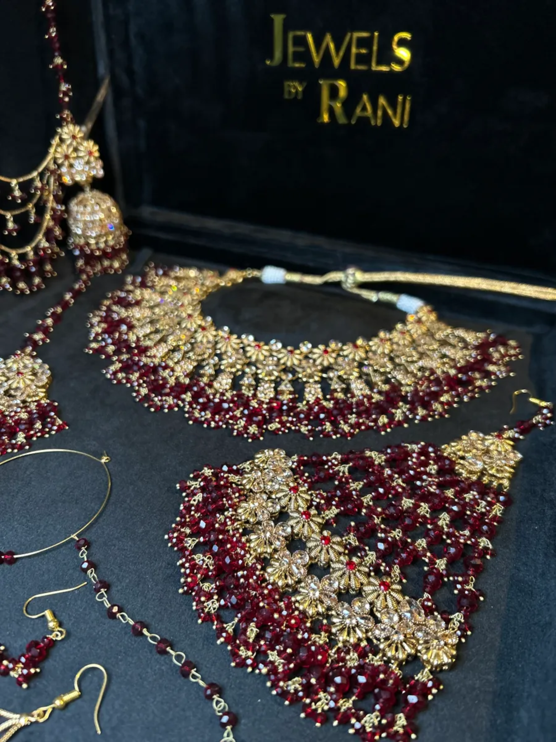 Beautiful Maroon 24 crt Gold Plated Bridal Jewellery Set - Jewelsbyrani