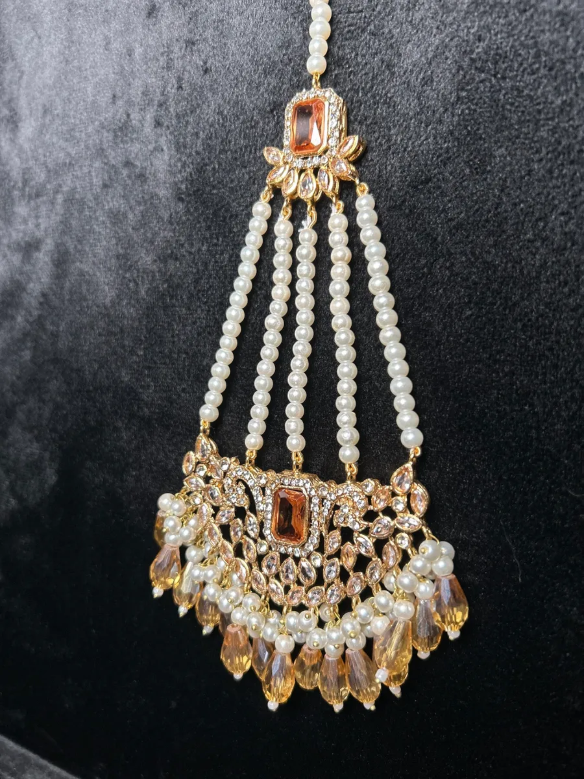 Gold and White heavily beaded Jhumar.