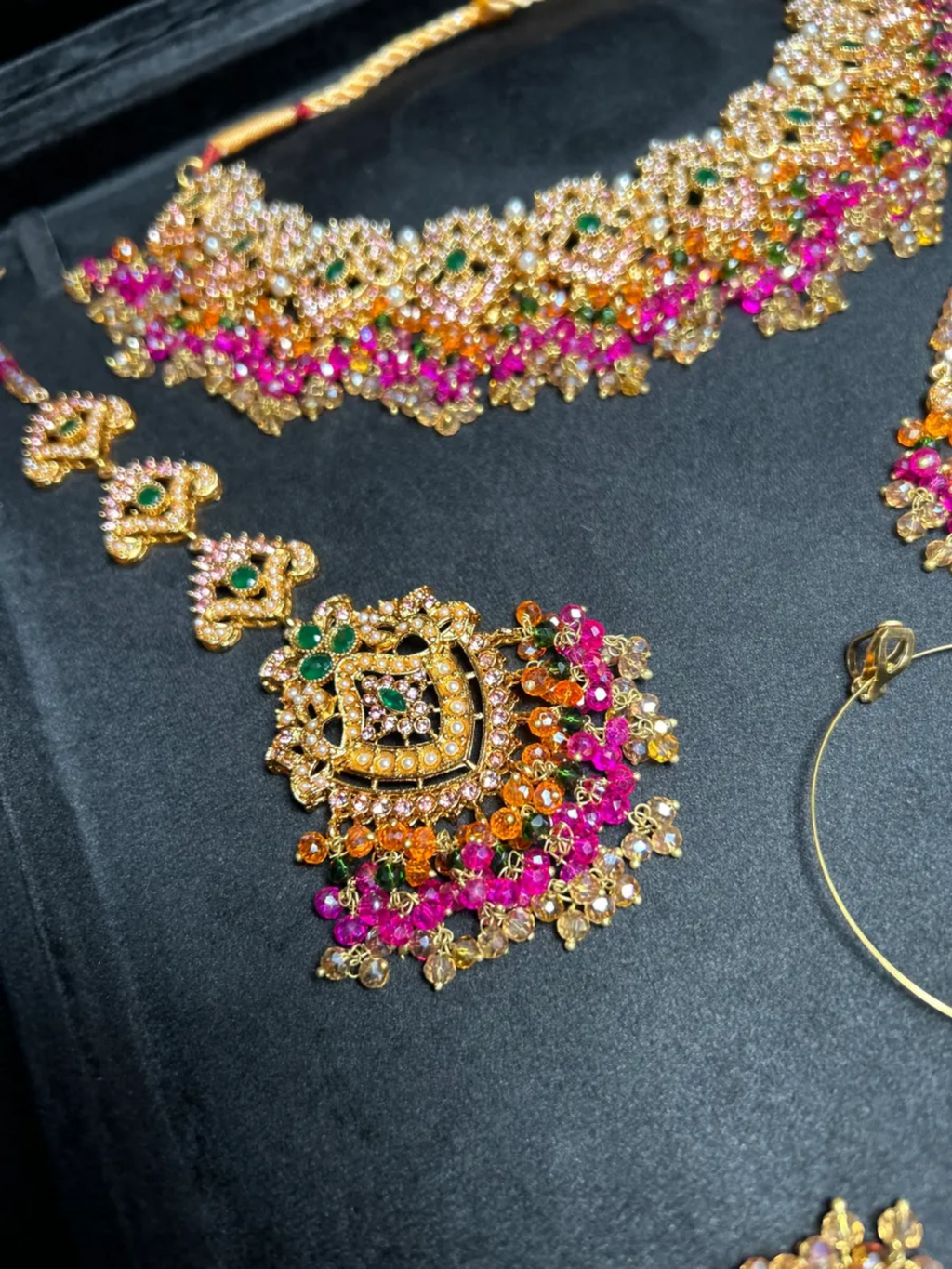Multi Neckkace Green, Orange & Hot Pink coloured necklace set, with heavily beaded Jhumkies & tikka - Jewelsbyrani