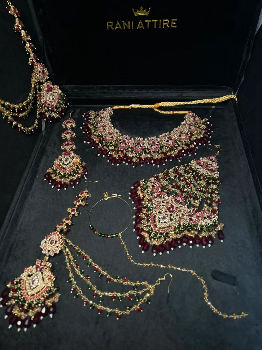 Green and Maroon Crystal set, with heavily beaded jhumkies & tikka. - Jewelsbyrani