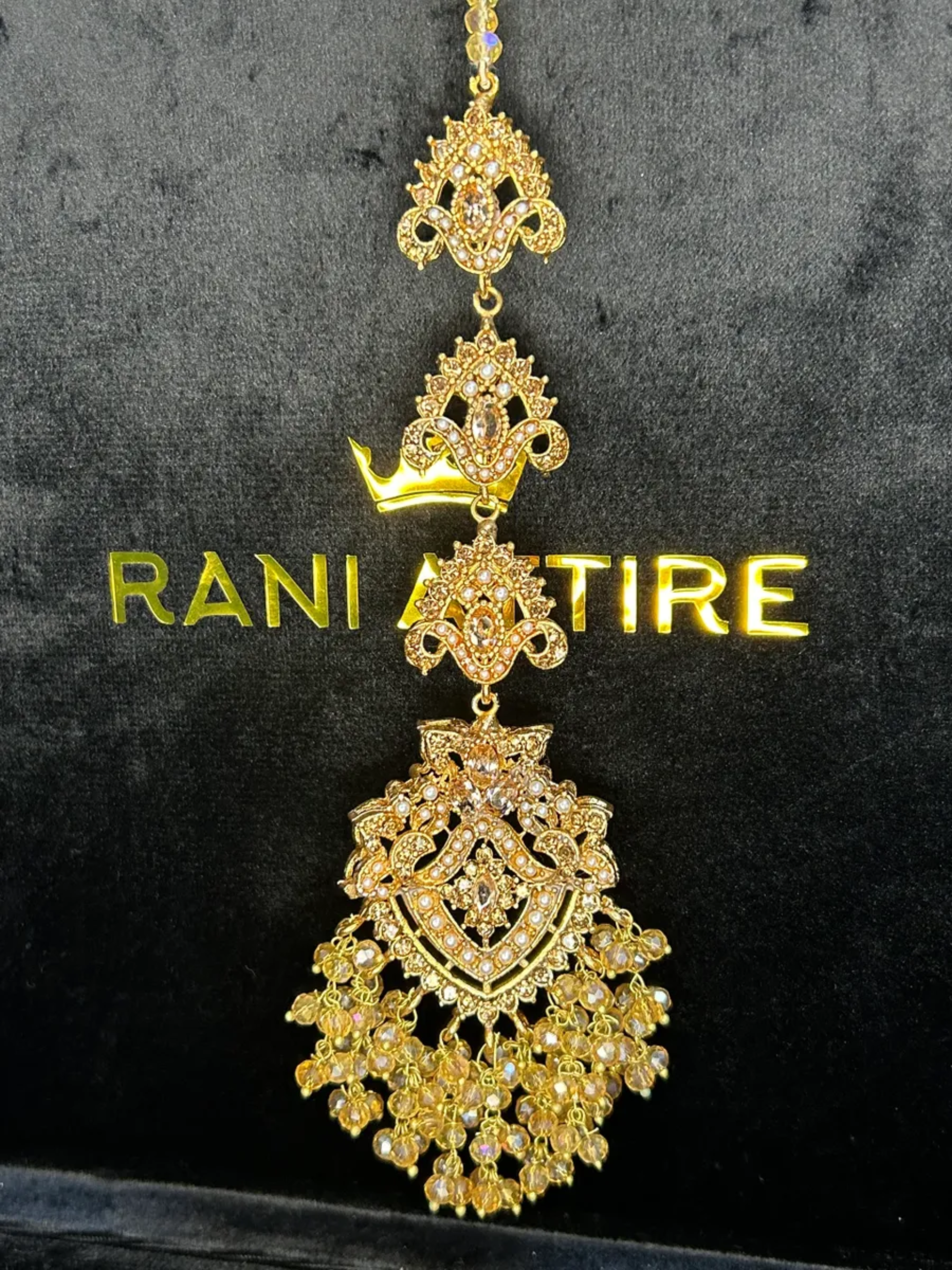 Gold heavily beaded tikka. - Jewelsbyrani