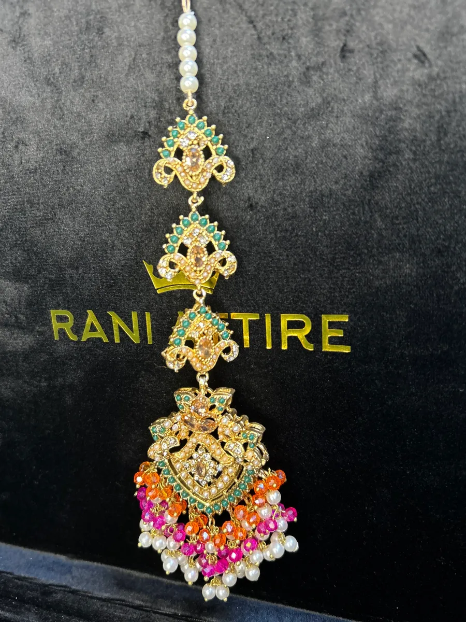 Multi heavily beaded tikka.