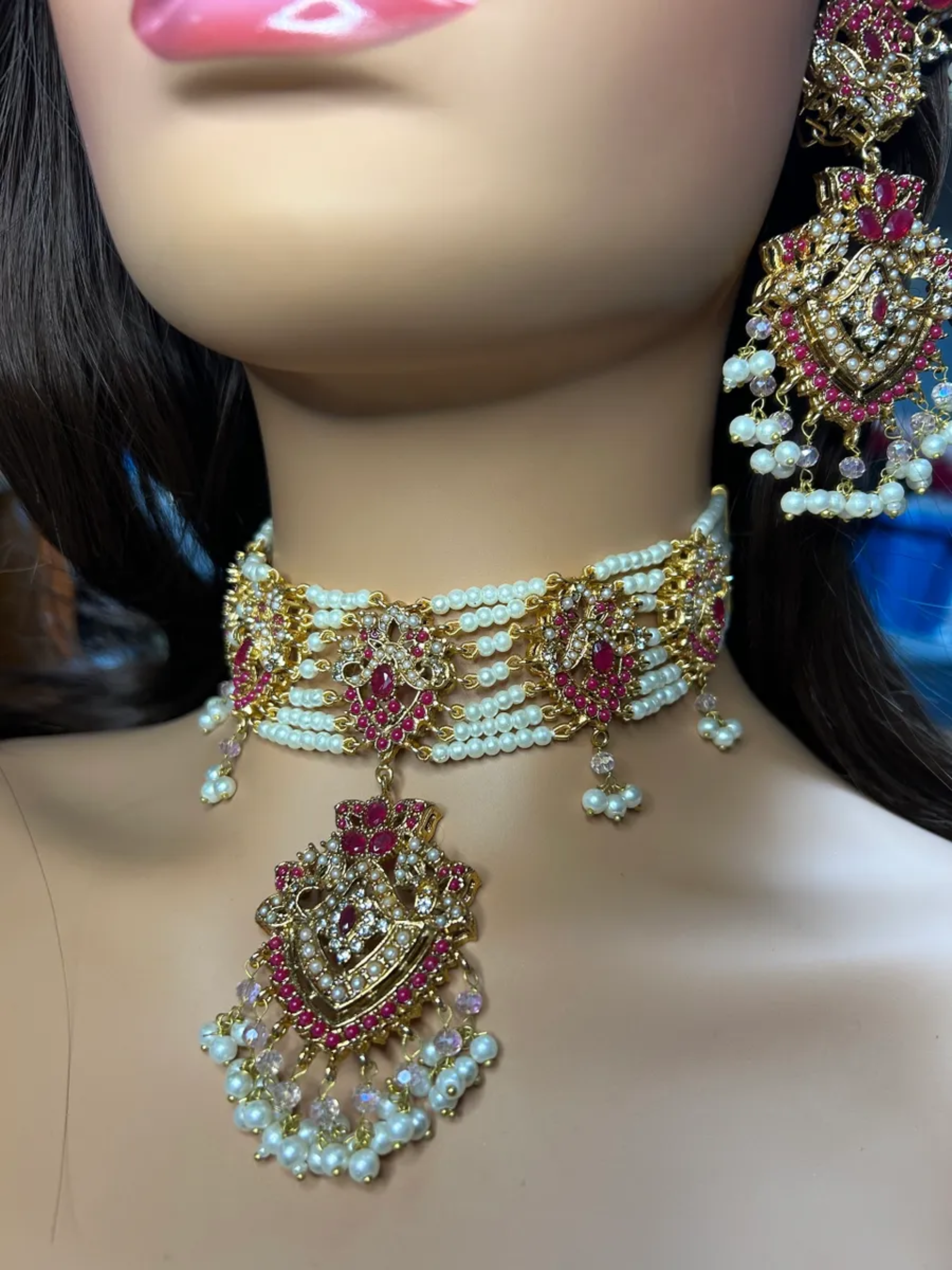 Gold & baby pink Choker set, with heavily beaded jhumkies & tikka.