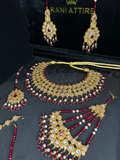 Gold & Maroon set, with heavily beaded jhumkies & tikka. - Jewelsbyrani