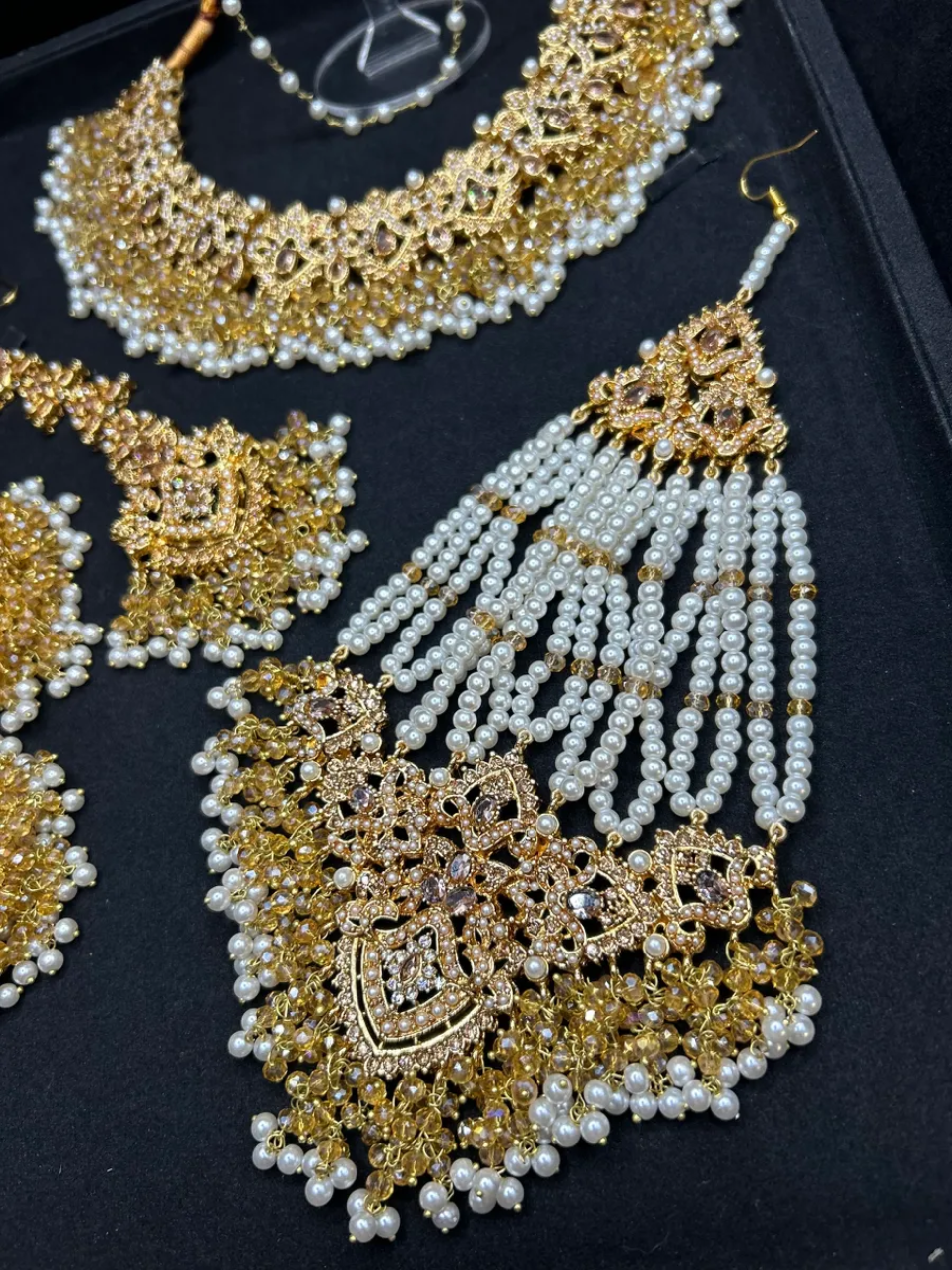 Gold & White Necklace set, with heavily beaded jhumkies & tikka.