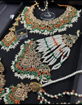 Orange & Green coloured necklace set, with heavily beaded earrings & tikka - Jewelsbyrani