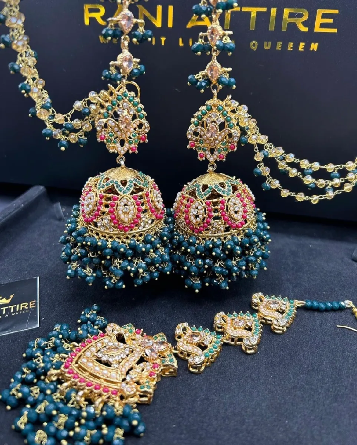 Dark Green Jhumkes and Tikka with Beaded Saharas.