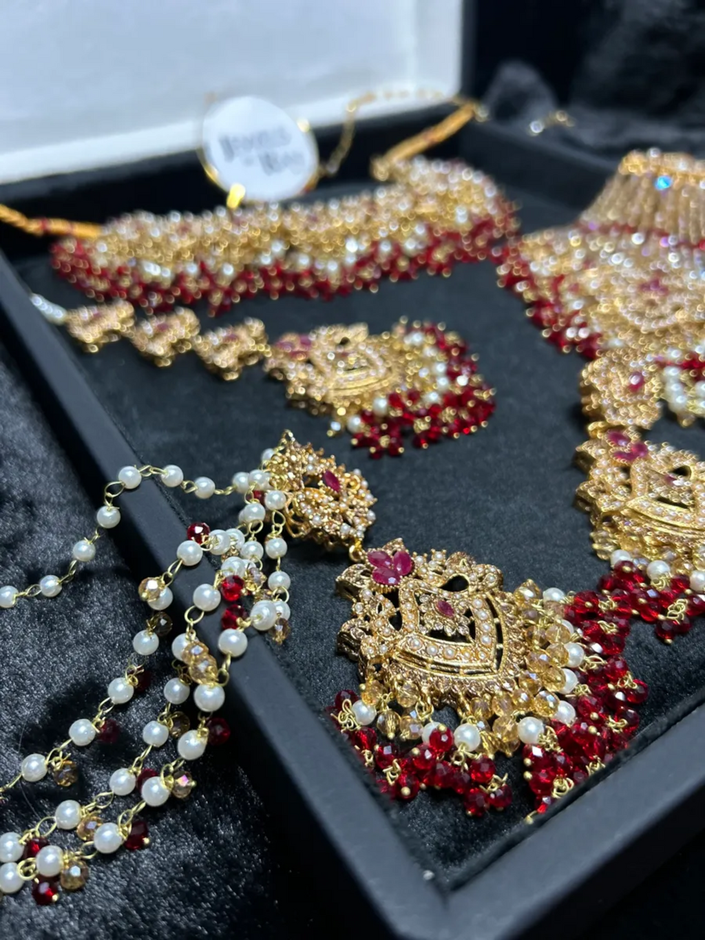 Gold, Deep Red & white set Bridal Jewellery Set with heavily beaded earrings & tikka. - Jewelsbyrani
