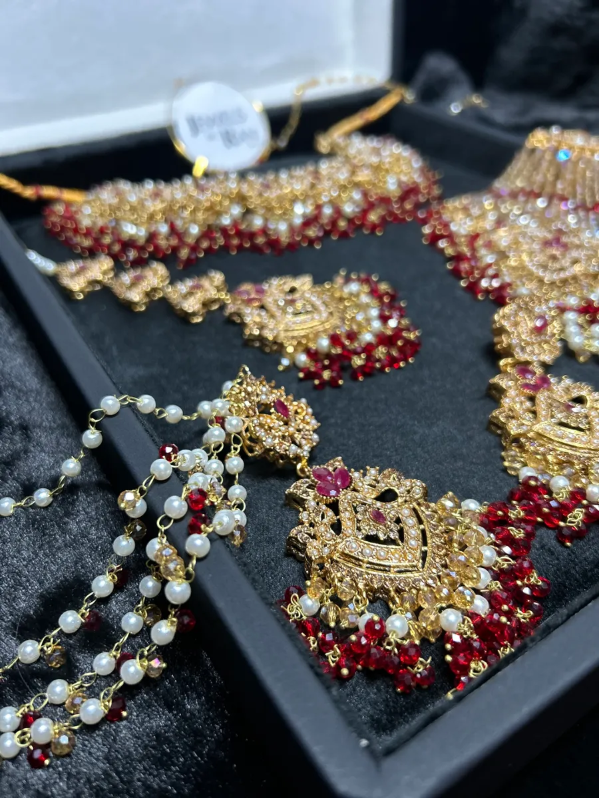 Gold, Deep Red & white set Bridal Jewellery Set with heavily beaded earrings & tikka. - Jewelsbyrani