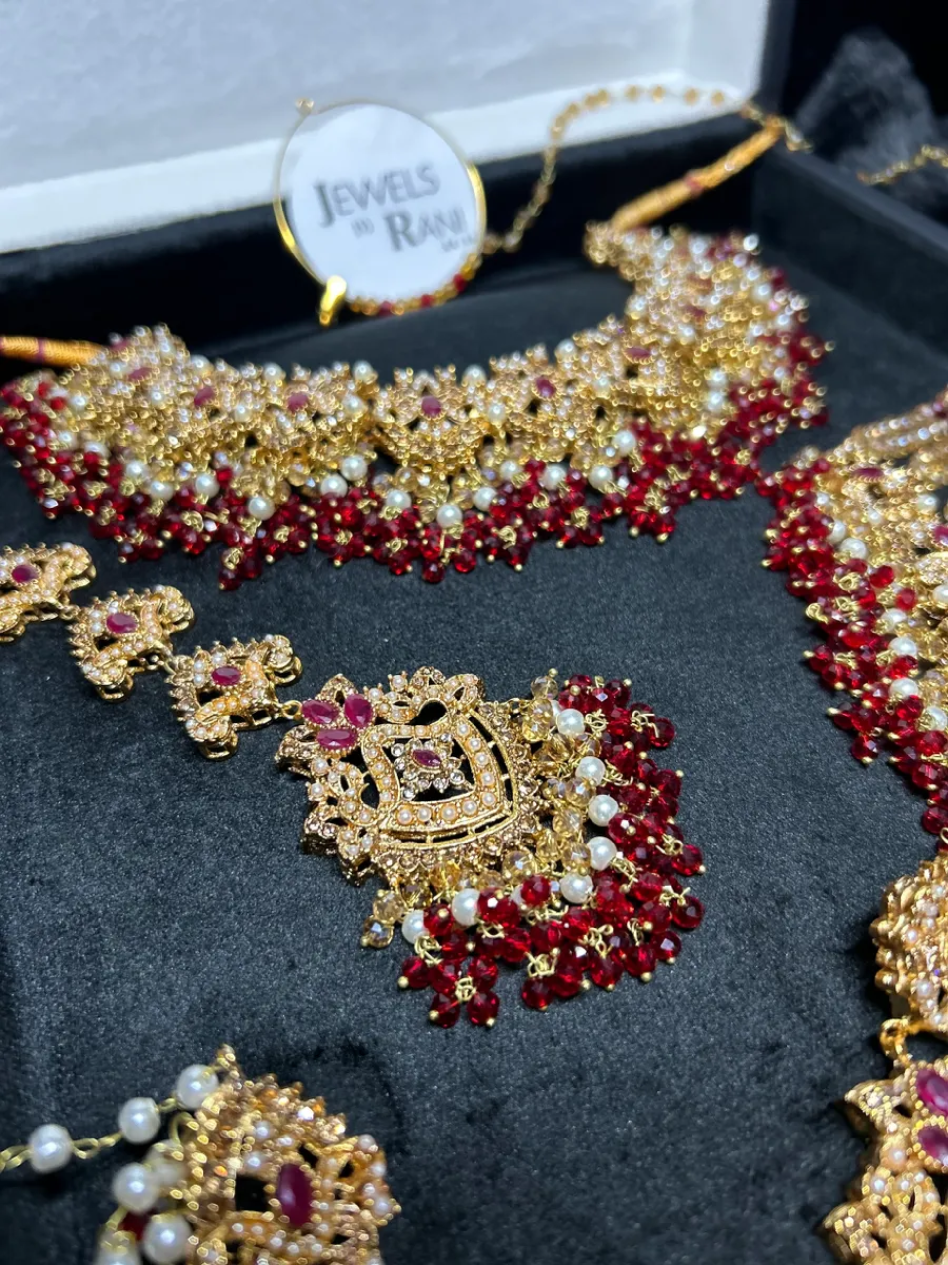 Gold, Deep Red & white set Bridal Jewellery Set with heavily beaded earrings & tikka. - Jewelsbyrani