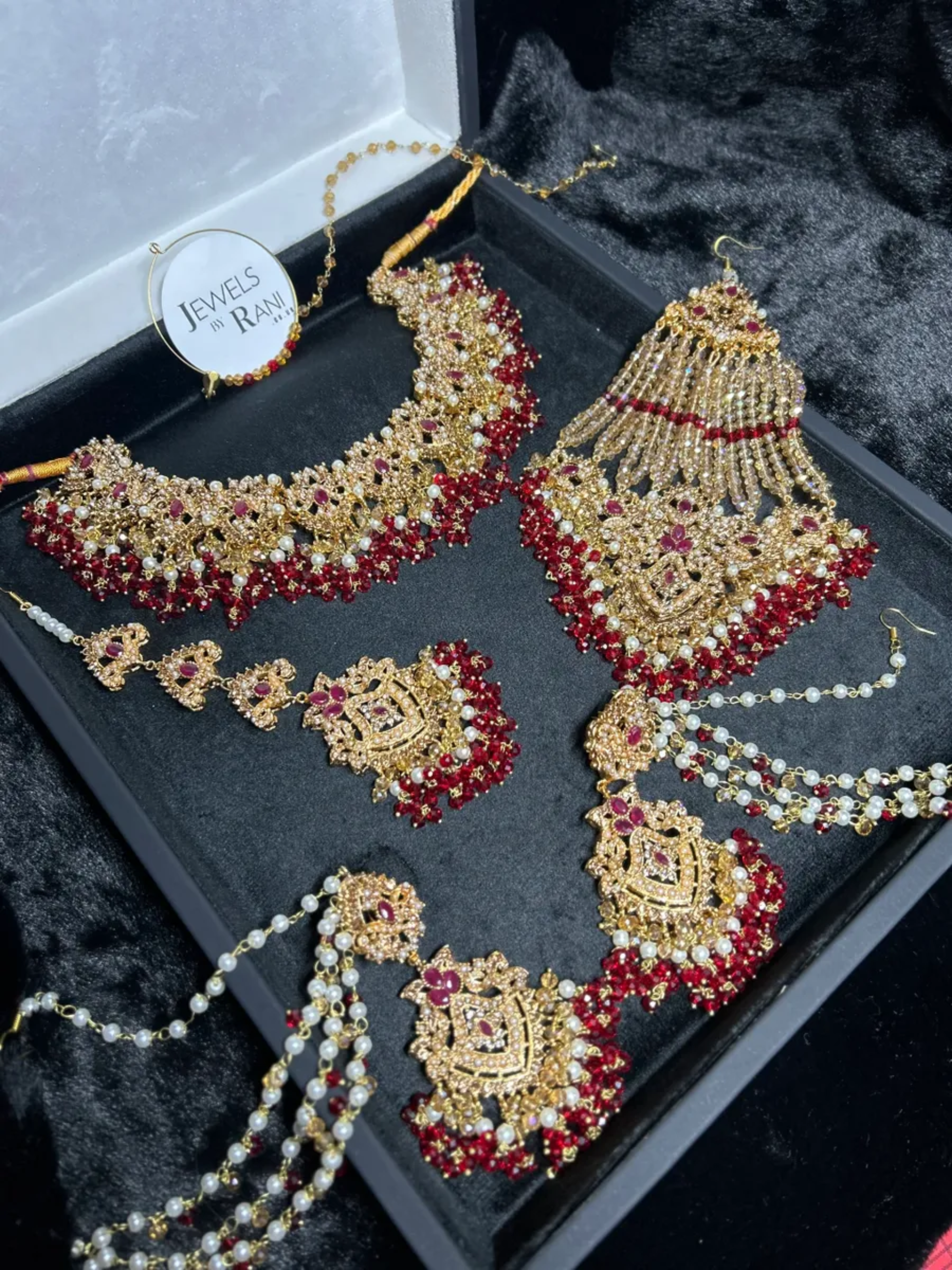 Gold, Deep Red & white set Bridal Jewellery Set with heavily beaded earrings & tikka. - Jewelsbyrani