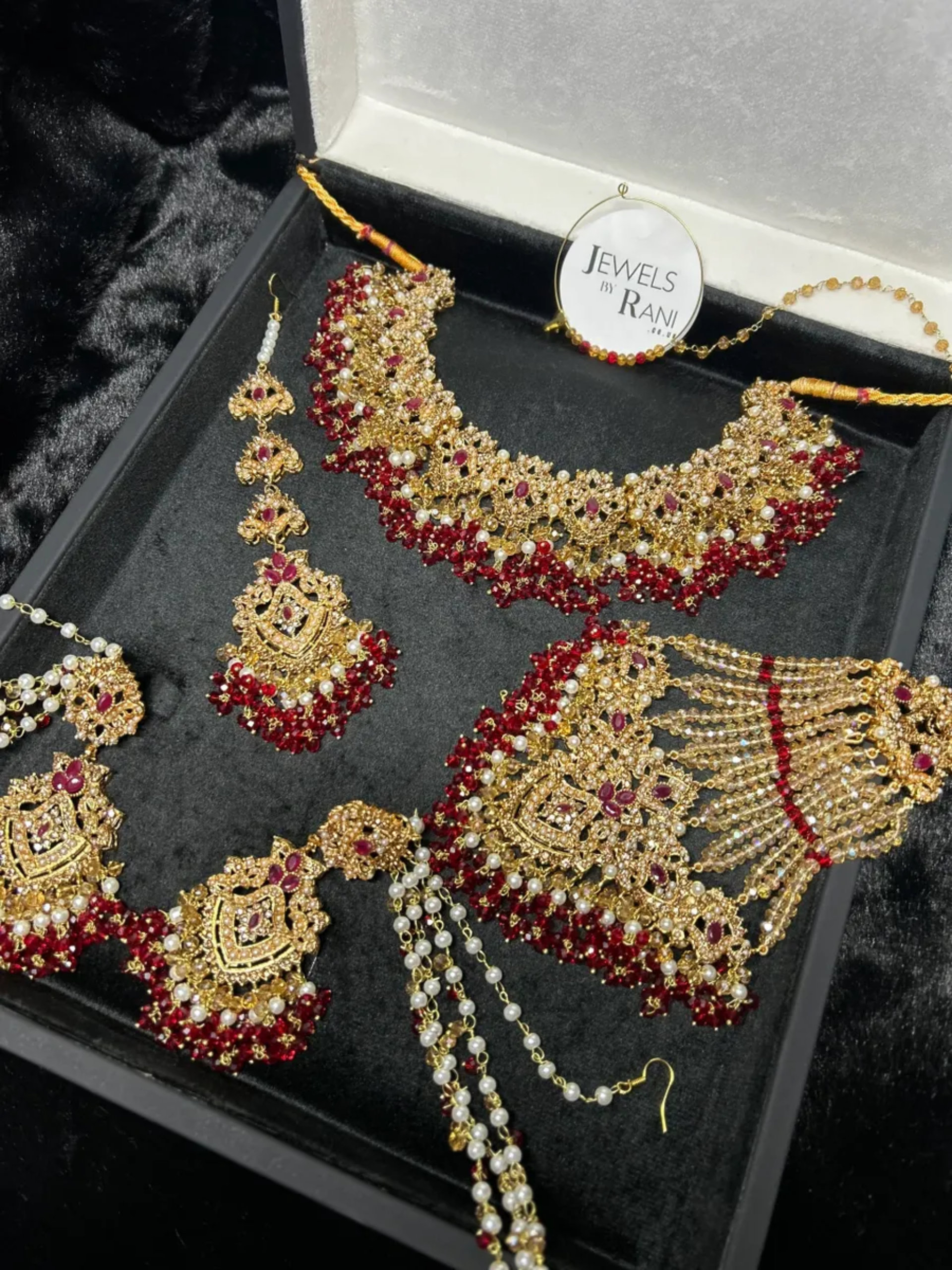 Gold, Deep Red & white set Bridal Jewellery Set with heavily beaded earrings & tikka. - Jewelsbyrani