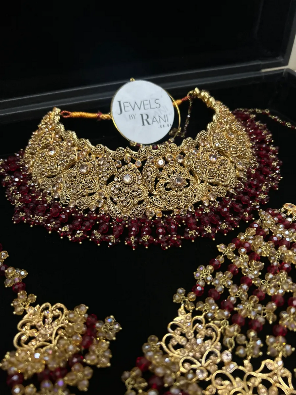 Deep Red & Gold Collar Necklace set, with heavily beaded earrings & tikka. - Jewelsbyrani