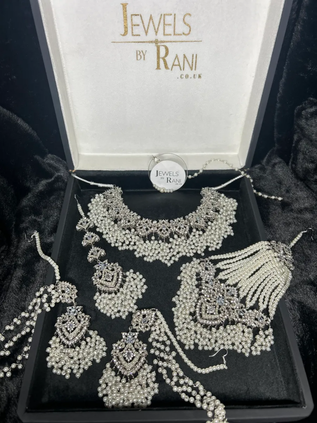 Stunning White necklace set, with heavily beaded earrings & tikka - Jewelsbyrani