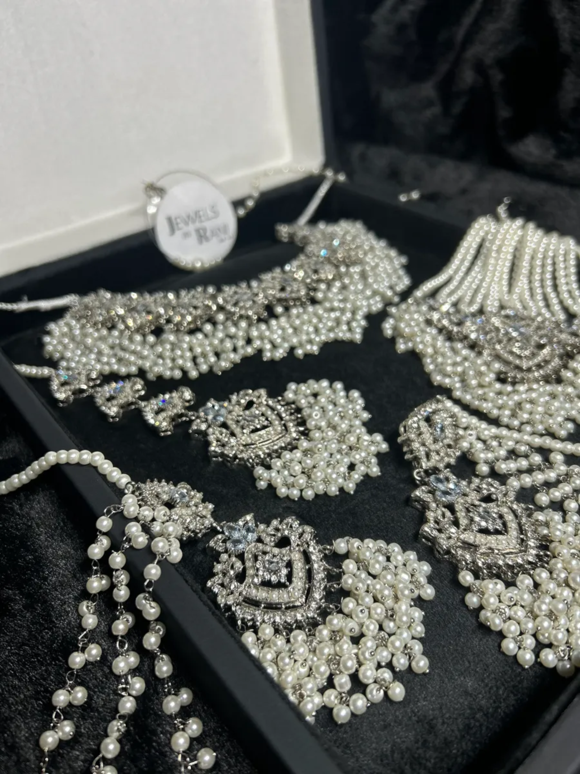 Stunning White necklace set, with heavily beaded earrings & tikka - Jewelsbyrani