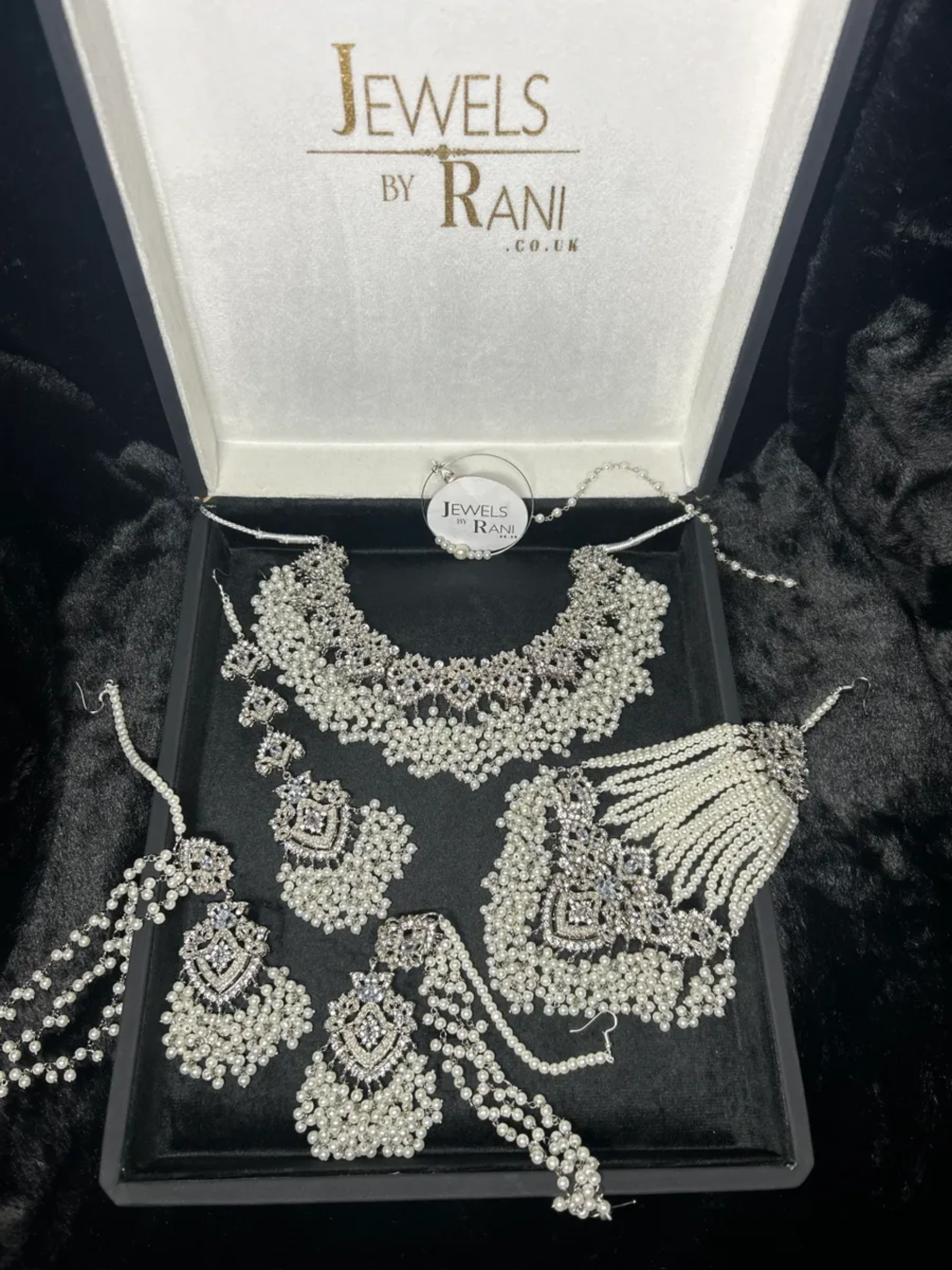 Stunning White necklace set, with heavily beaded earrings & tikka - Jewelsbyrani