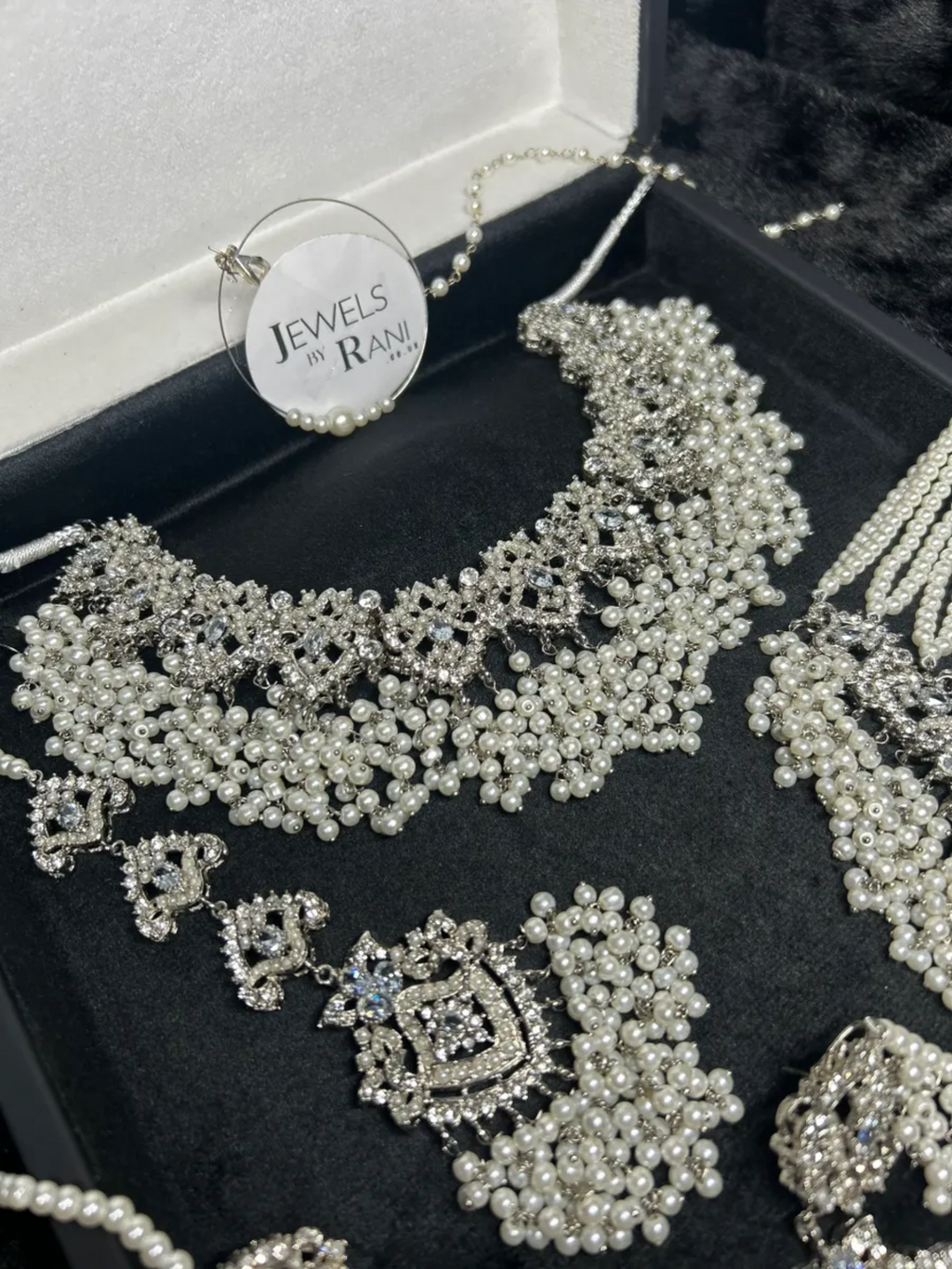 Stunning White necklace set, with heavily beaded earrings & tikka - Jewelsbyrani
