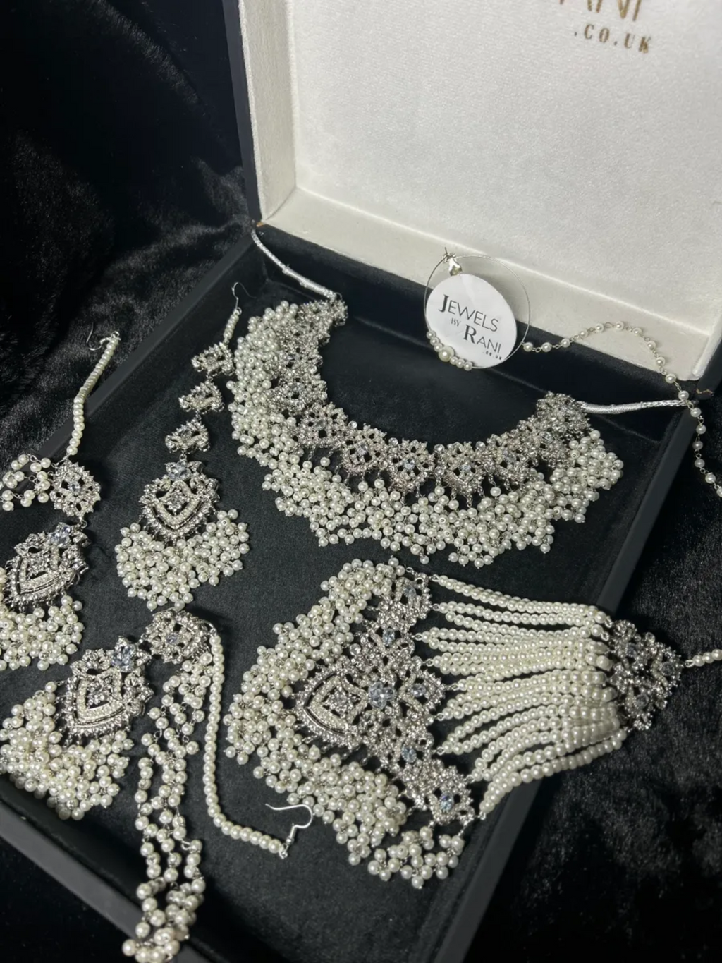 Stunning White necklace set, with heavily beaded earrings & tikka - Jewelsbyrani