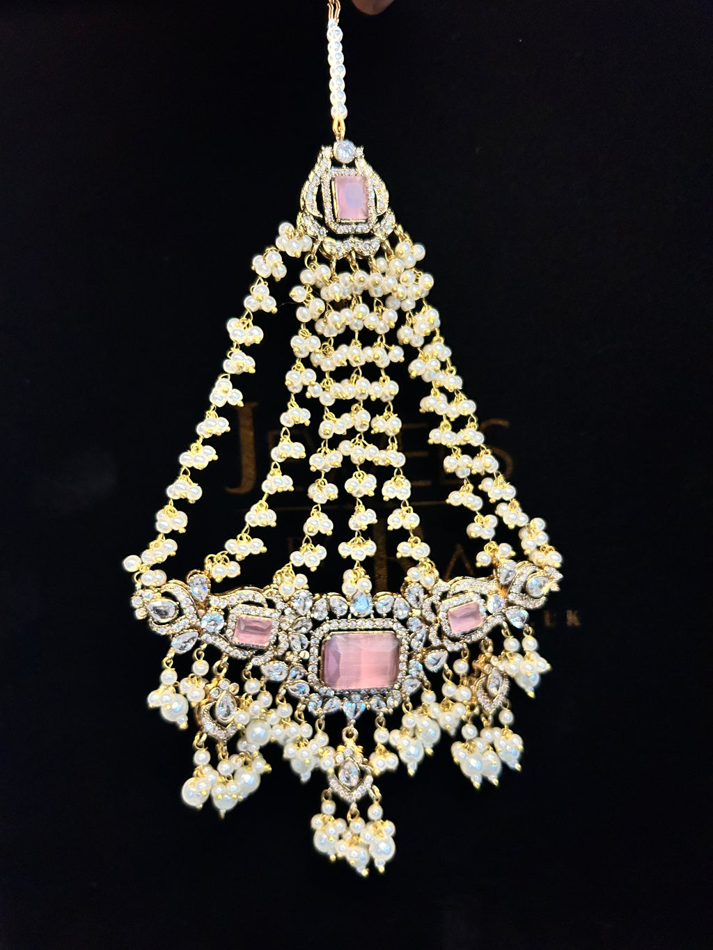 Pink and White Coloured heavily beaded jhumar