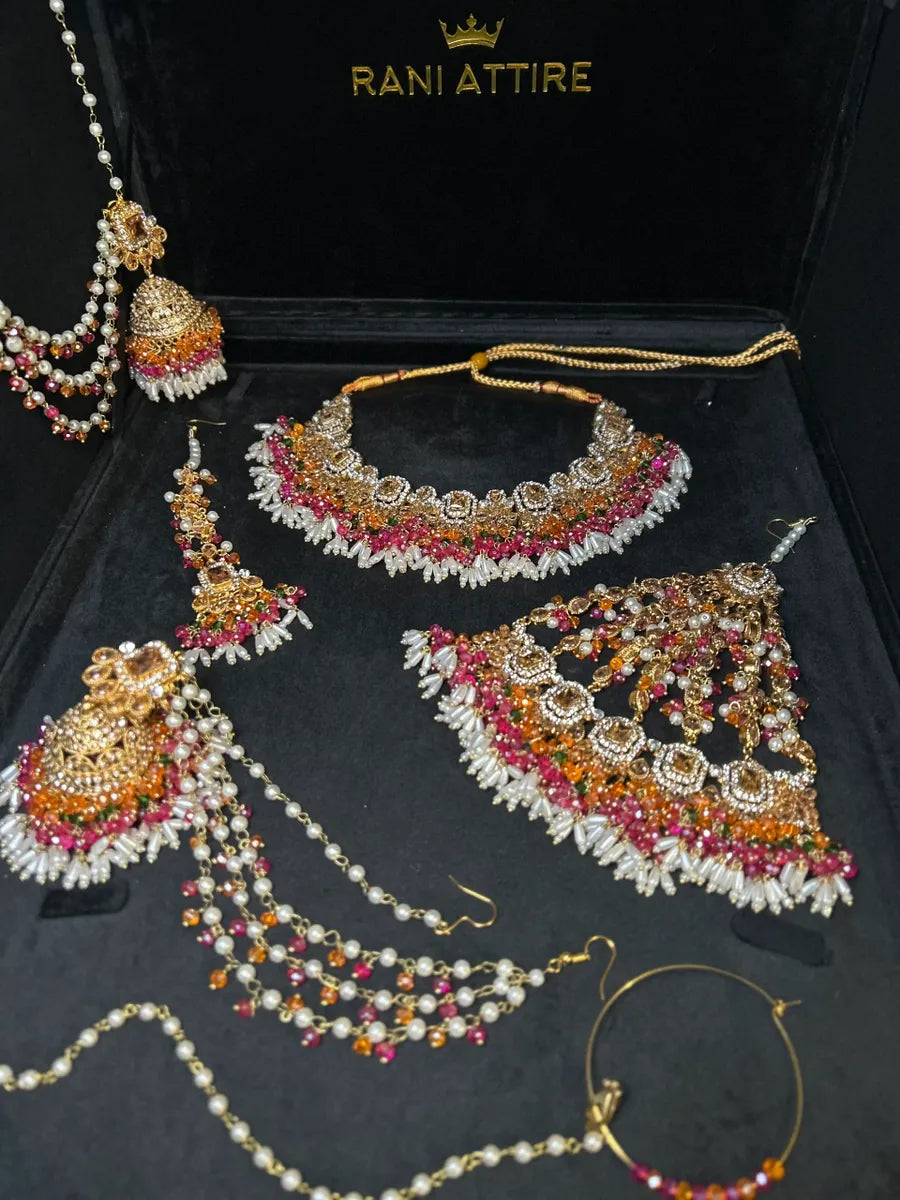 Dazzling Multi coloured necklace set, with heavily beaded earrings & tikka - Jewelsbyrani
