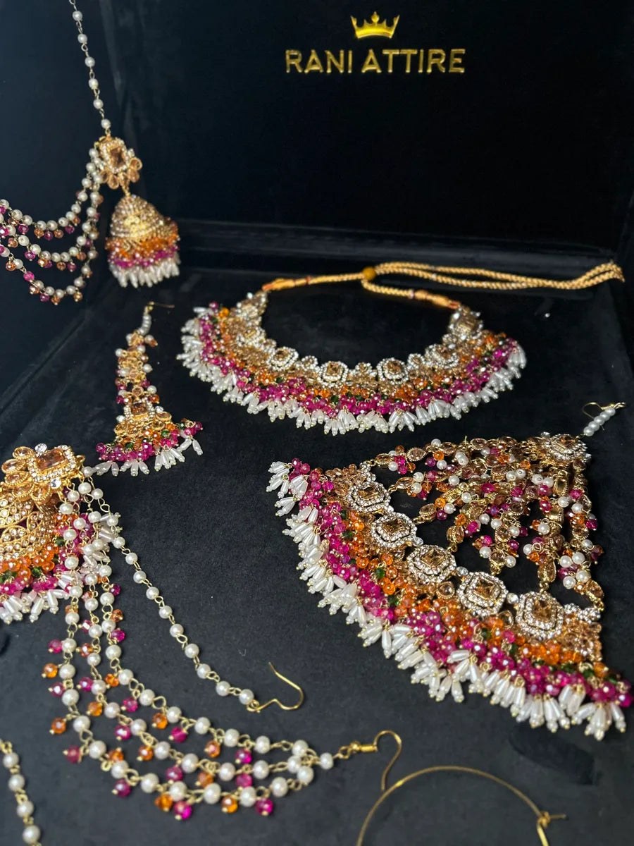 Dazzling Multi coloured necklace set, with heavily beaded earrings & tikka