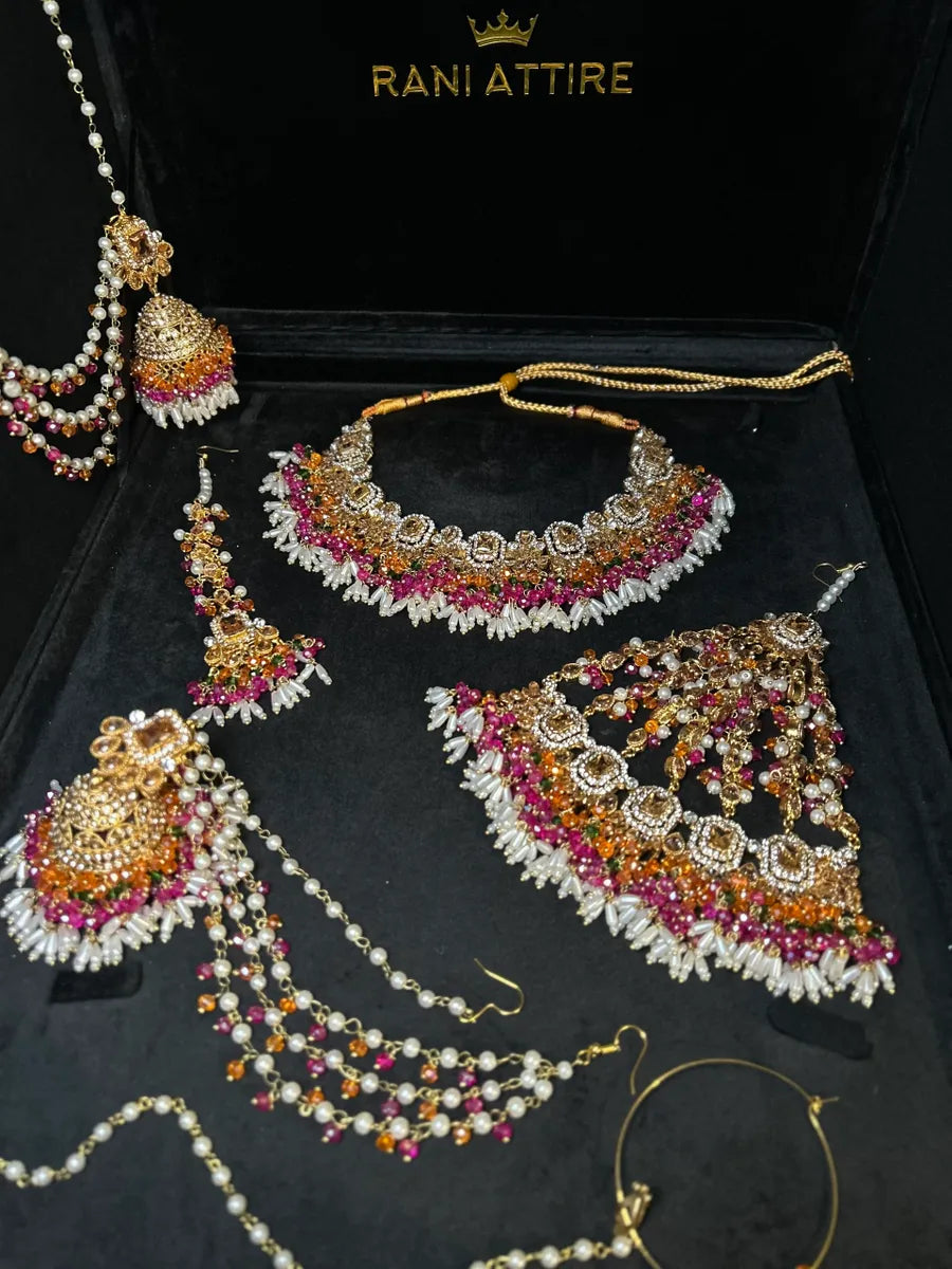Dazzling Multi coloured necklace set, with heavily beaded earrings & tikka