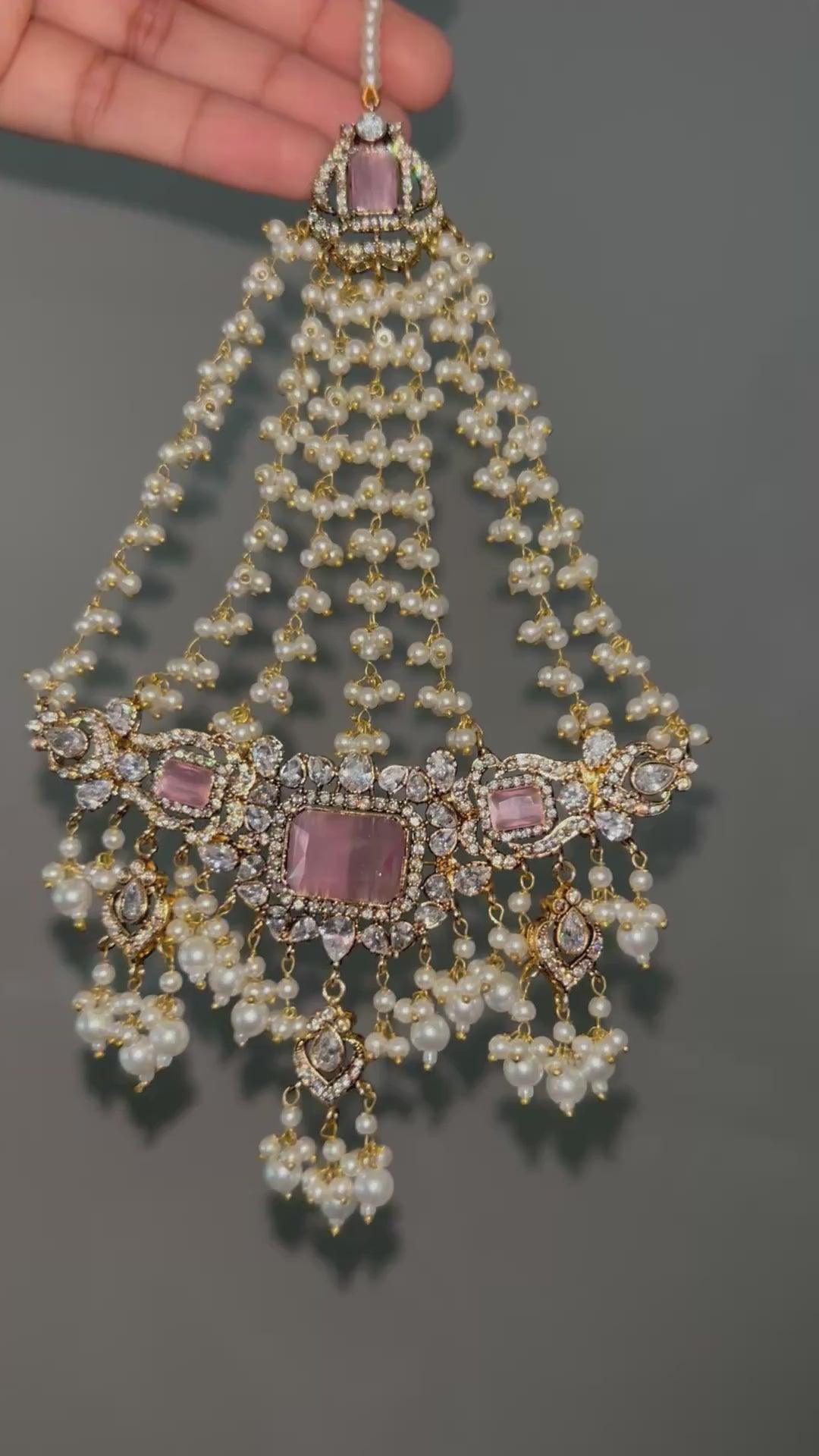 Pink and White Coloured heavily beaded jhumar